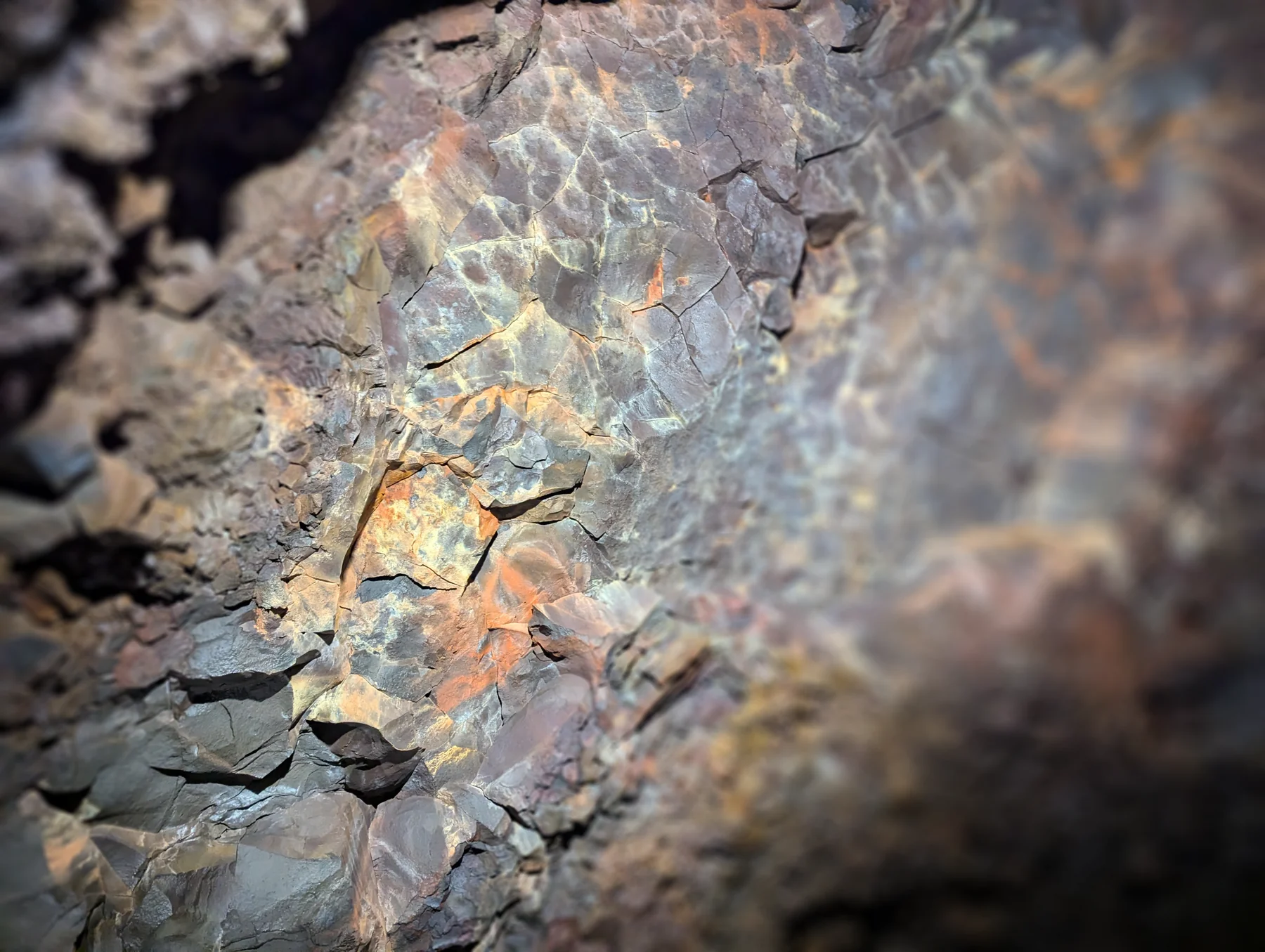 Light refracting across the surface of a rock