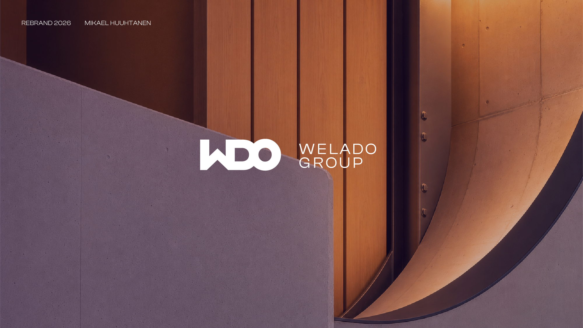 Welado Group identity applied to warm architectural infrastructure photography